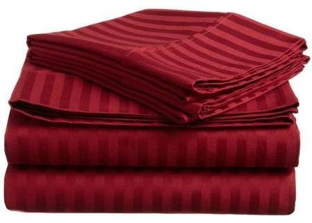 This cherry red bedsheet set with pillowcases offers a touch of elegance and flair to any bedroom décor.